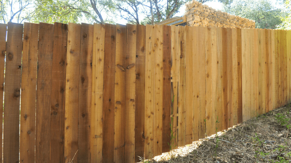 Light wood fence.