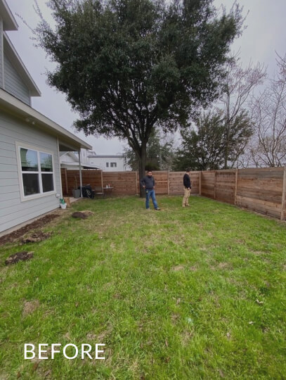 A backyard with sparse grass surrounded by a wooden fence. You can see the side of a white house on the left. There are two men in the yard and there is text on the overlaid on the image that says before.
