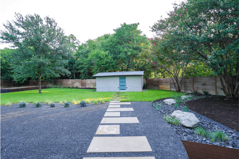 Black gravel with white stone steps