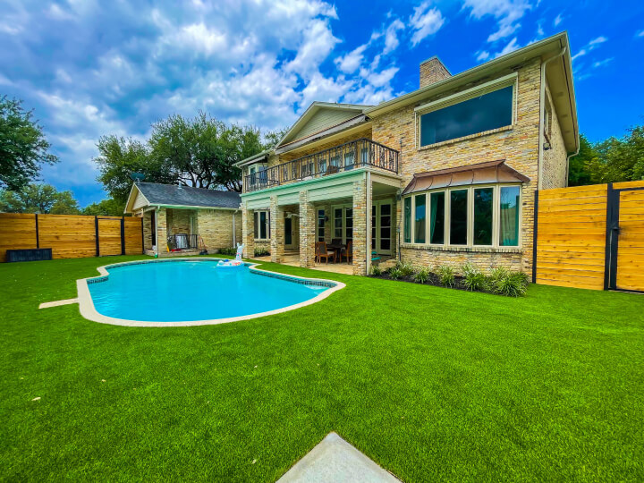 Cutters-steamboat springs green grass backyard with pool