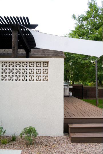 Cutters-allandale white stone wall wooden patio