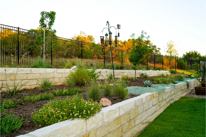 Cutters-trails of dripping springs flower beds white stone walls